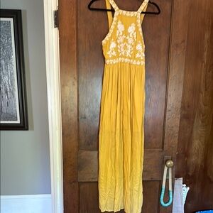 Golden maxi dress with white embroidery